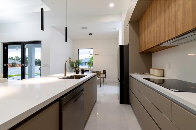 kitchen with decorative light fixtures, sink, french doors, black appliances, and light tile patterned floors