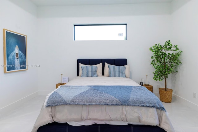 bedroom with tile patterned floors