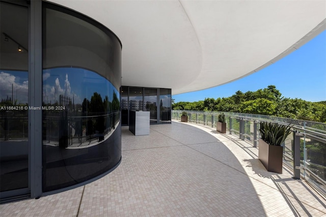 view of patio with a balcony