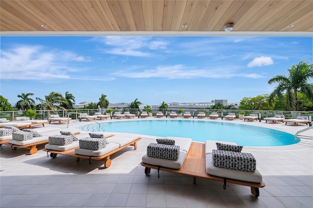 view of swimming pool featuring a patio area