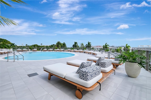 view of pool with a patio