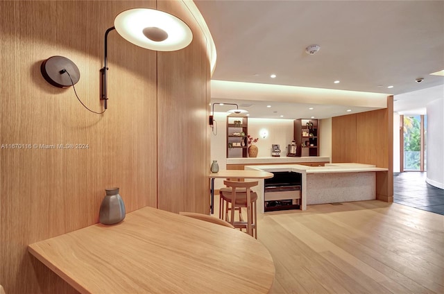 dining area with light hardwood / wood-style floors