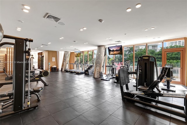 gym with floor to ceiling windows