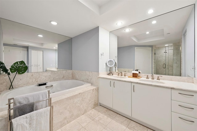 bathroom featuring tile patterned floors, vanity, and separate shower and tub