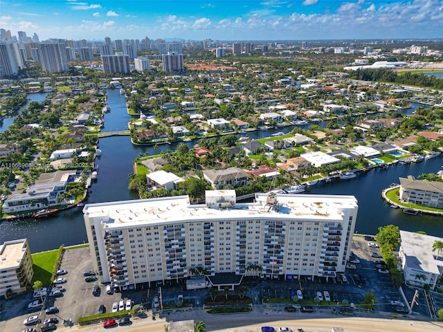 bird's eye view with a water view and a view of city