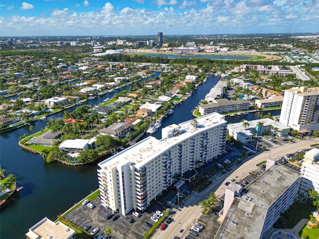 bird's eye view featuring a view of city and a water view