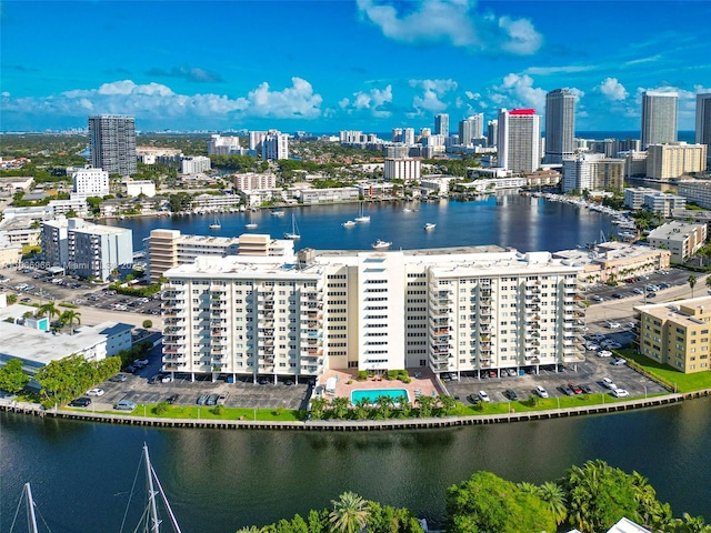 aerial view featuring a water view and a city view