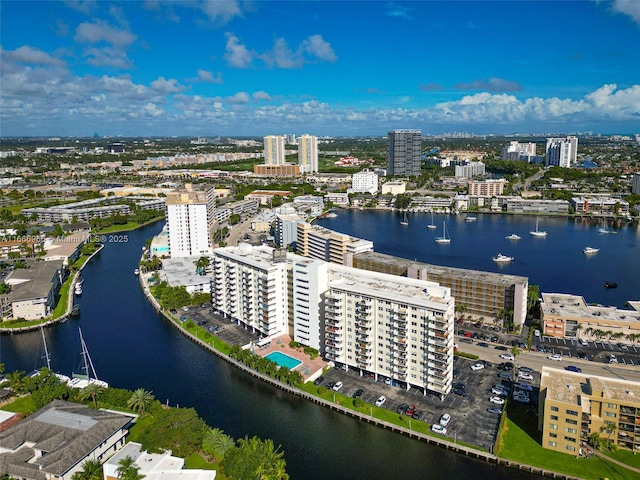 drone / aerial view with a water view and a view of city