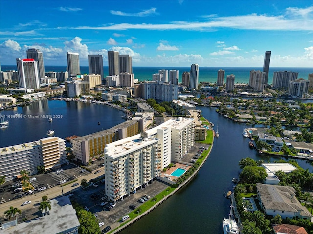 aerial view featuring a water view and a city view