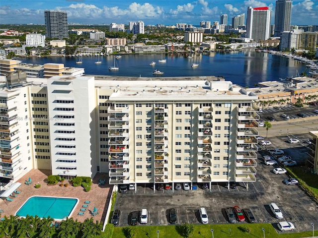 aerial view with a water view and a city view