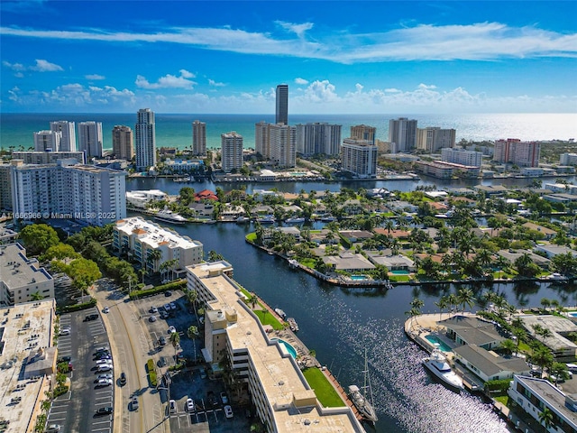 aerial view featuring a water view and a city view