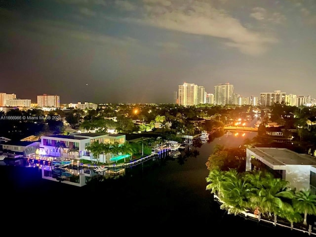 property's view of city featuring a water view