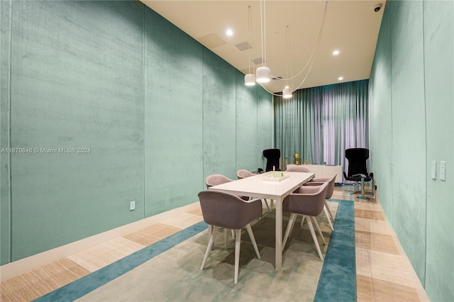 dining area featuring a chandelier