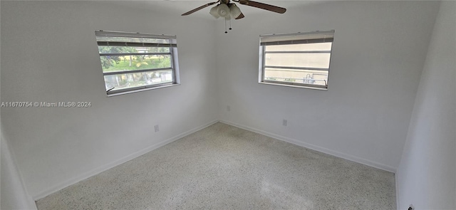 spare room featuring ceiling fan