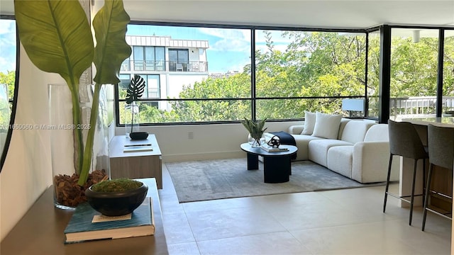 150 Sunrise Dr Unit 4B, Key Biscayne, FL 33149 - sunroom featuring tile patterned floors and baseboards