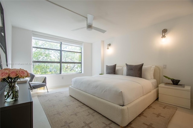 150 Sunrise Dr Unit 4B, Key Biscayne, FL 33149 - bedroom featuring light tile patterned floors and ceiling fan