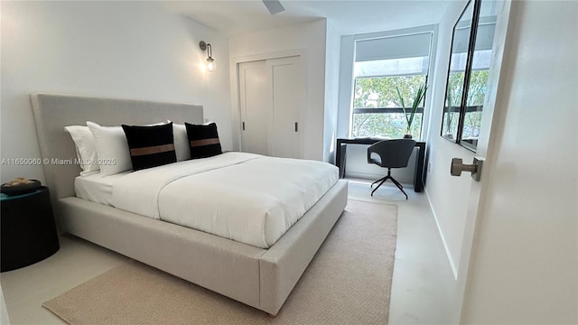 150 Sunrise Dr Unit 4B, Key Biscayne, FL 33149 - bedroom featuring a closet and baseboards