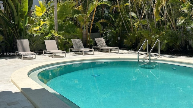 150 Sunrise Dr Unit 4B, Key Biscayne, FL 33149 - outdoor pool featuring a patio area