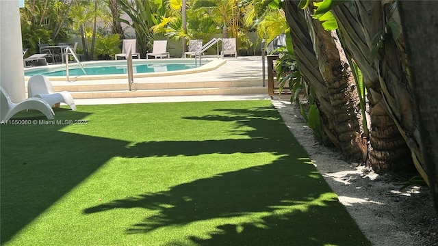 150 Sunrise Dr Unit 4B, Key Biscayne, FL 33149 - view of yard featuring a patio
