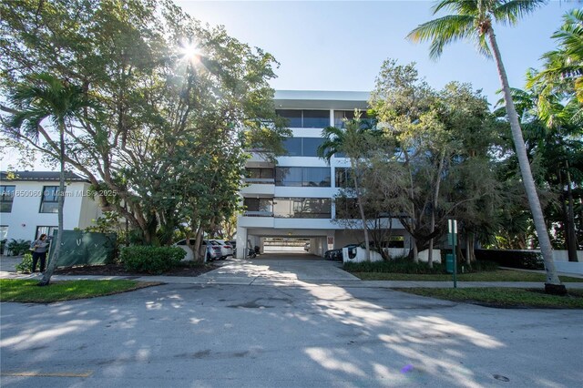 150 Sunrise Dr Unit 4B, Key Biscayne, FL 33149 - view of property with driveway and a carport
