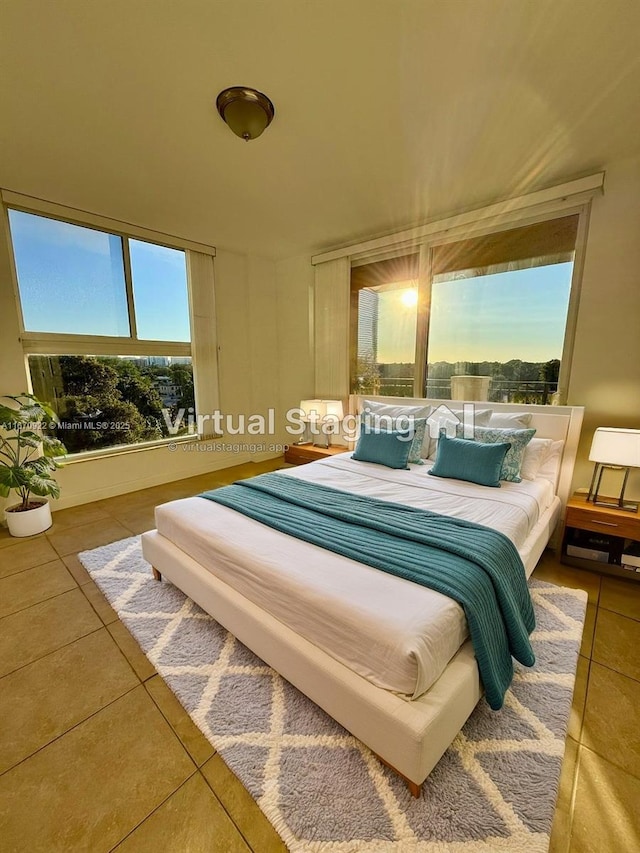 bedroom with tile patterned floors