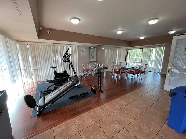 workout area featuring hardwood / wood-style floors