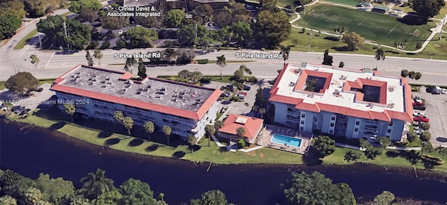 birds eye view of property featuring a water view