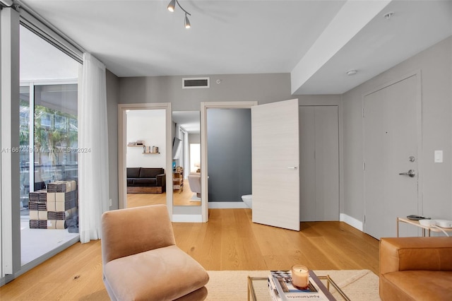 living room with hardwood / wood-style floors