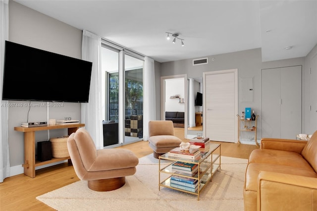 living area with wood-type flooring