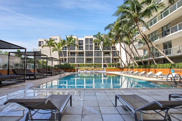 view of swimming pool featuring a patio area