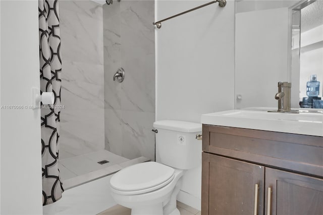 bathroom featuring walk in shower, vanity, and toilet