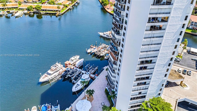 birds eye view of property featuring a water view