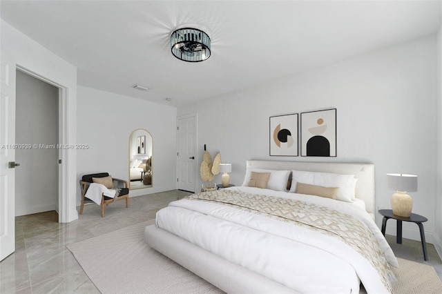 bedroom with marble finish floor, visible vents, and baseboards