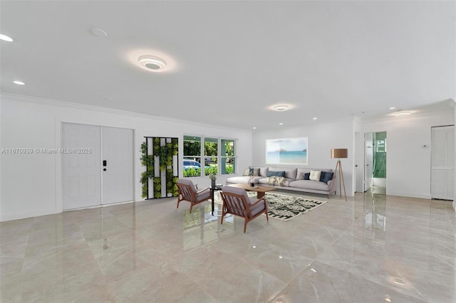 living area with recessed lighting, marble finish floor, and ornamental molding