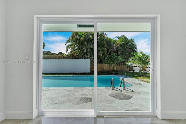 view of swimming pool with a patio