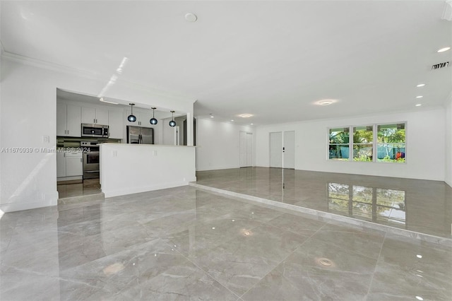 unfurnished living room with crown molding