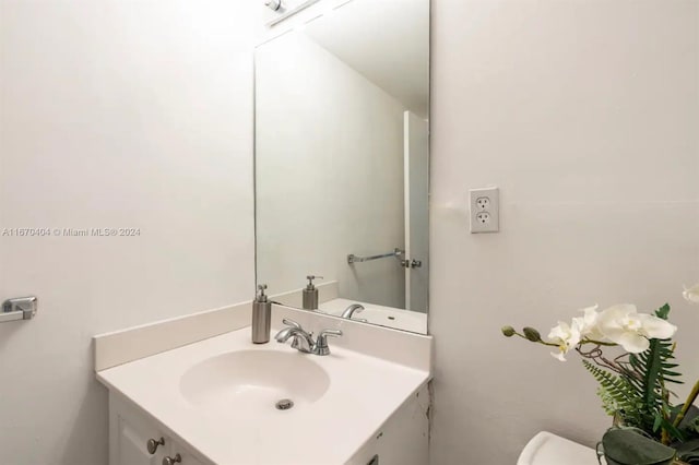 19370 Collins Ave Unit 207, Sunny Isles Beach, FL 33160 - bathroom featuring vanity and toilet