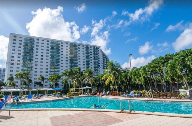 19370 Collins Ave Unit 207, Sunny Isles Beach, FL 33160 - community pool featuring a patio