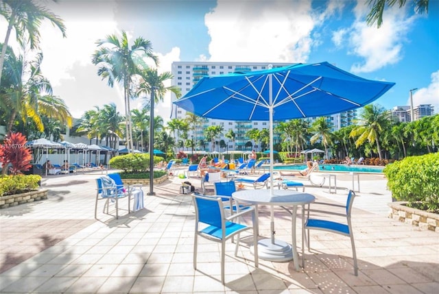 view of patio featuring a community pool