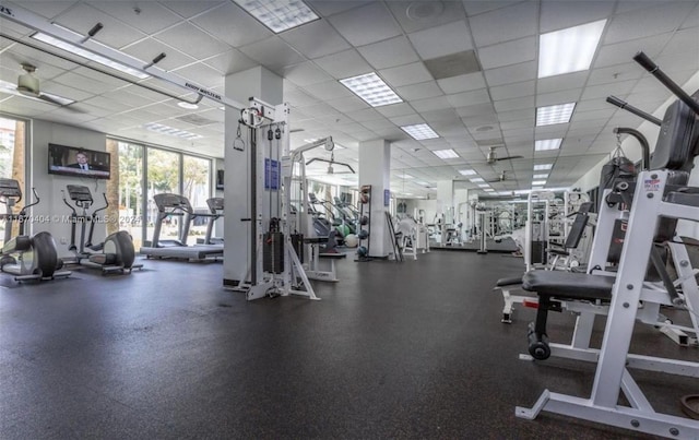 19370 Collins Ave Unit 207, Sunny Isles Beach, FL 33160 - gym with a paneled ceiling