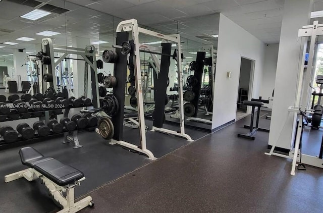 gym with a drop ceiling