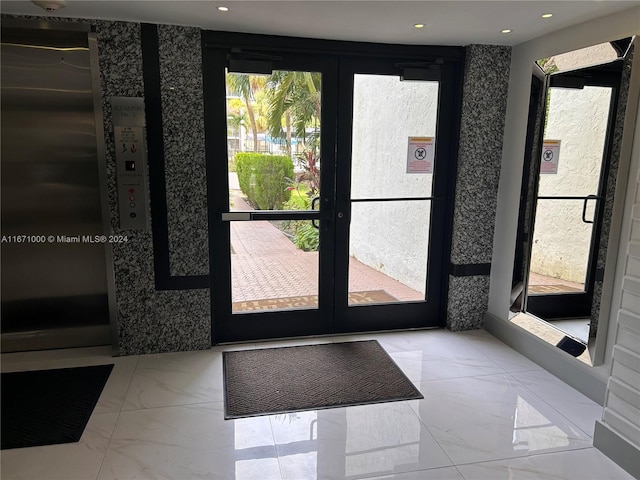 16919 N Bay Rd Unit 204, Sunny Isles Beach, FL 33160 - doorway with marble finish floors, elevator, recessed lighting, and french doors