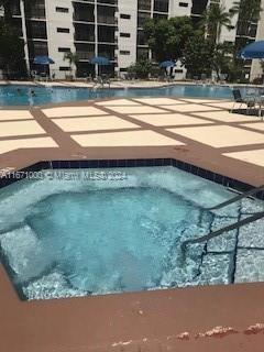 16919 N Bay Rd Unit 204, Sunny Isles Beach, FL 33160 - community pool with a hot tub