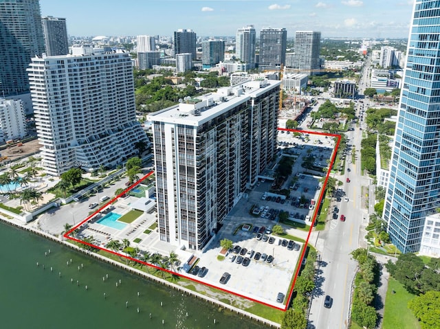 birds eye view of property featuring a water view