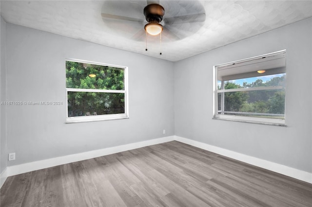 unfurnished room featuring wood-type flooring and ceiling fan