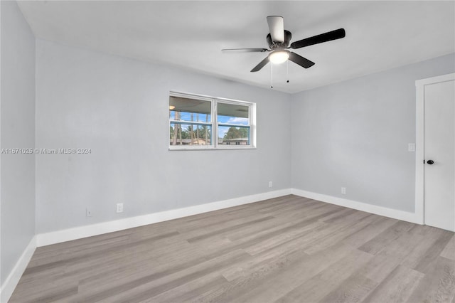 unfurnished room with light wood-type flooring and ceiling fan