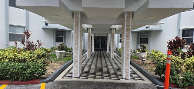 1913 S Ocean Dr Unit 138, Hallandale Beach, FL 33009 - doorway to property with stucco siding