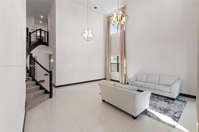 tiled living room featuring a chandelier