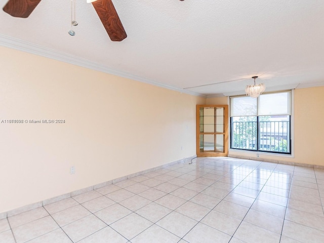 tiled empty room with ceiling fan with notable chandelier, a textured ceiling, and crown molding