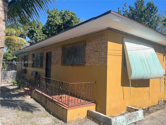 view of property exterior featuring cooling unit